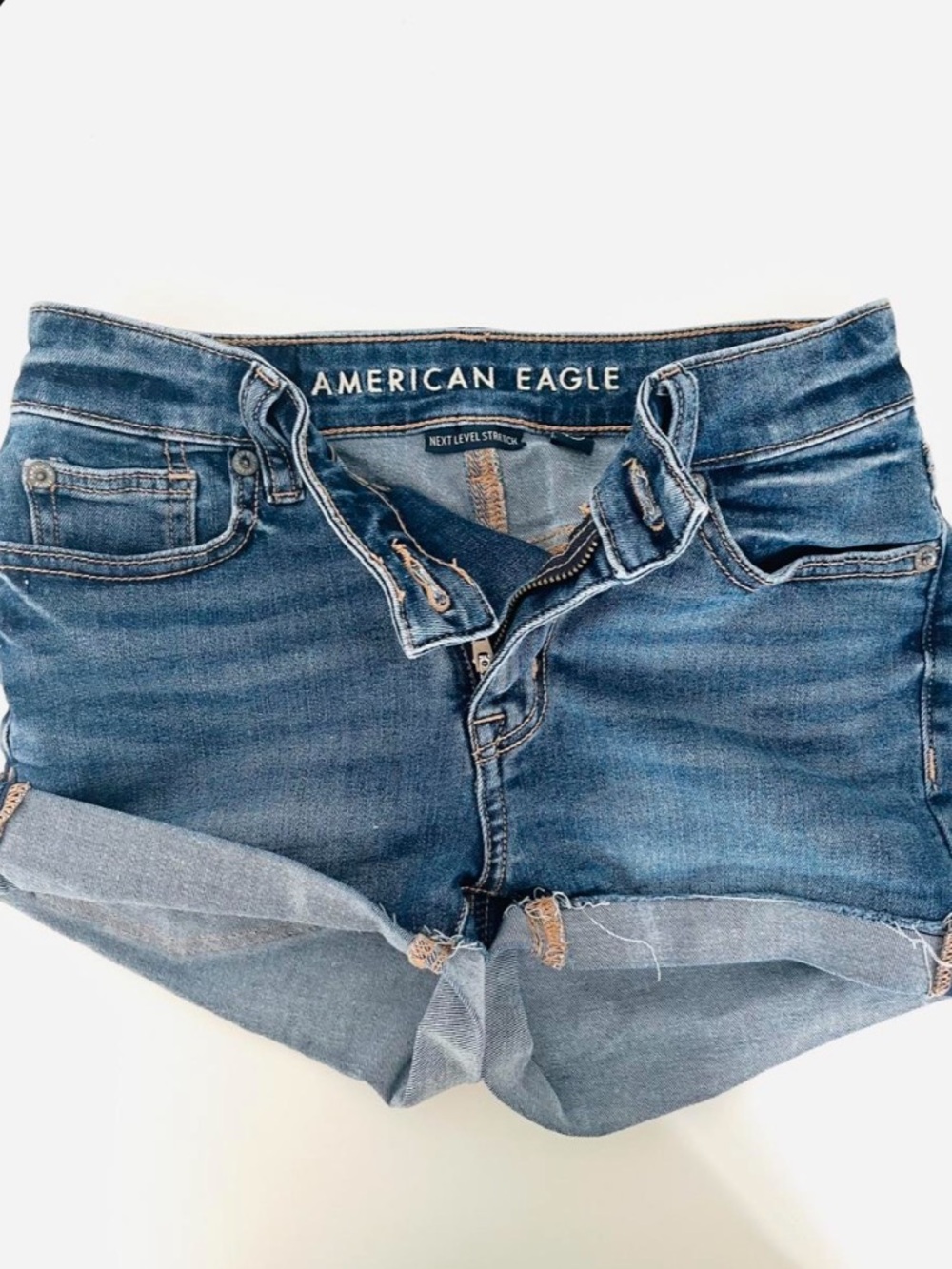 AE Next Level High-Waisted Crossover Denim Short Corto - Size 000